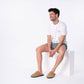 Pantofole in sherpa cammello con profili colorati