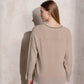 Maglione in maglia di lurex con scollo a V