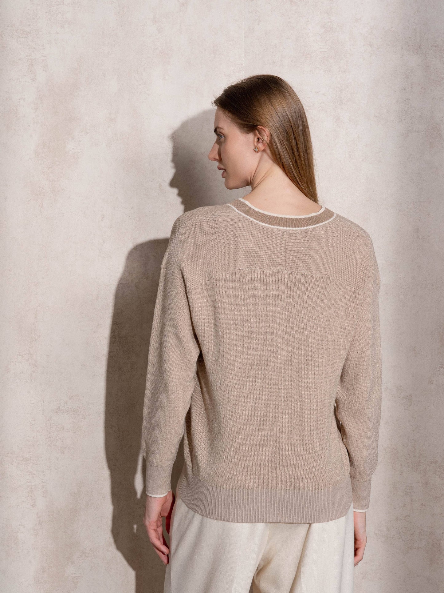 Maglione in maglia di lurex con scollo a V