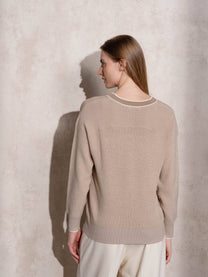 Maglione in maglia di lurex con scollo a V