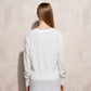 Set in maglia fine con cardigan e gonna ricamata