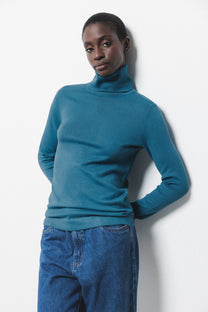 Maglione a maglia rasata con collo alto