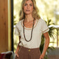 T-shirt in cotone con nastro ricamato