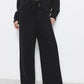 Pantaloni palazzo in maglia con vita elasticizzata