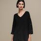 Maglione oversize con scollo a V e bottoni gioiello