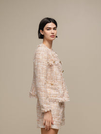 Blazer bouclé corto con bottoni gioiello