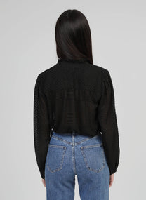 Blusa nera testurizzata con collo alla coreana