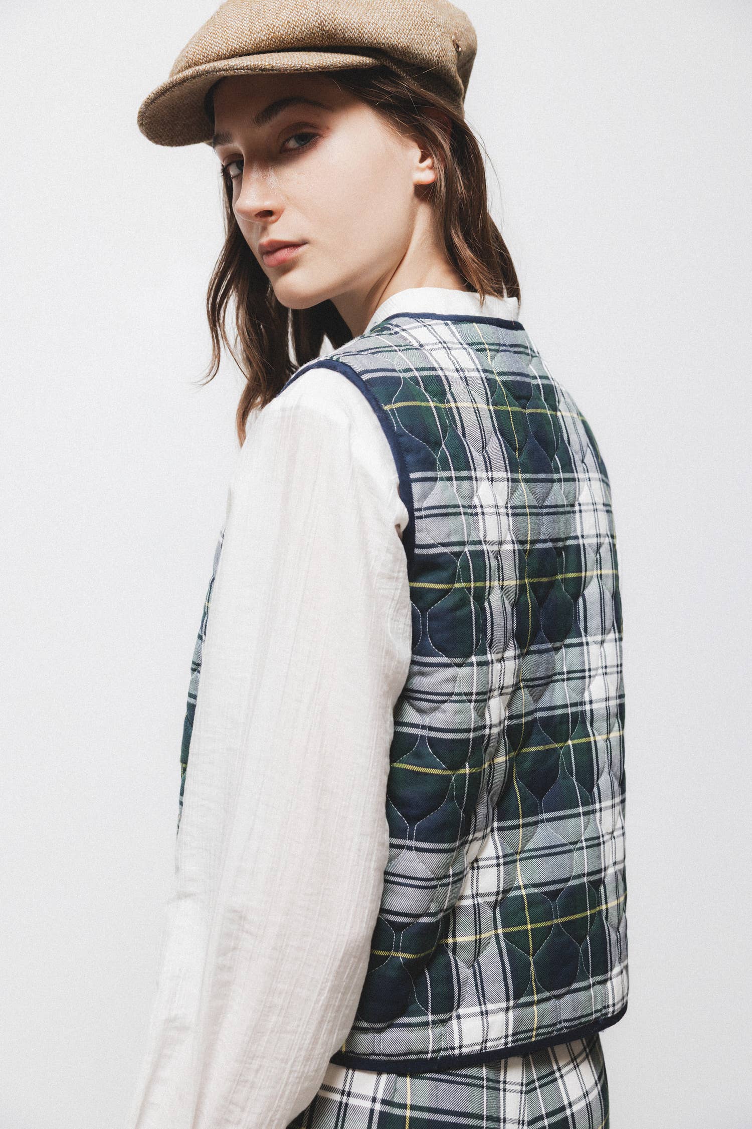 Gilet trapuntato tartan con scollo a V