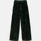 Pantaloni con paillettes verdi