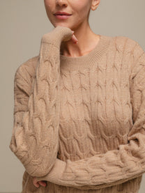 Maglione donna in maglia a trecce con filo luminoso