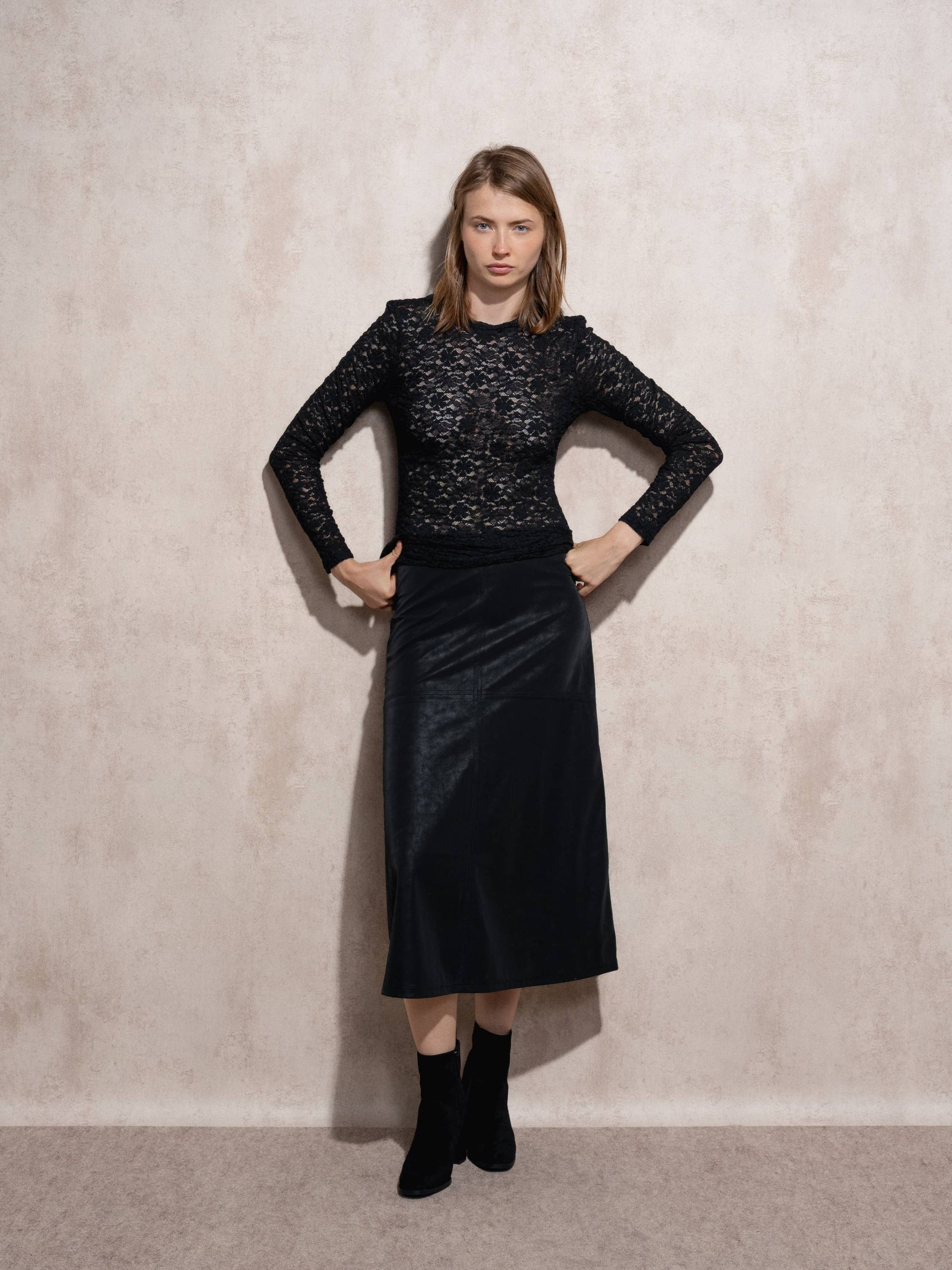 Blusa in pizzo elasticizzato