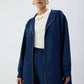 Giacca lunga con cappuccio e zip