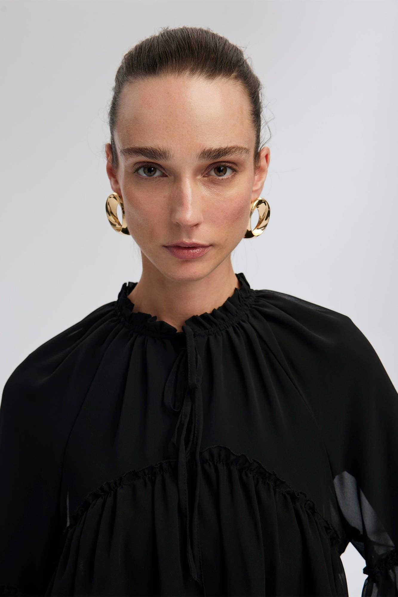 Camicetta in chiffon con balze