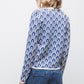 Maglione jacquard con motivo geometrico e scollo a V