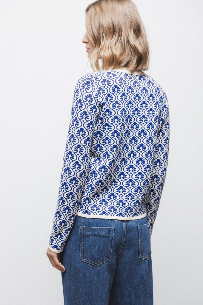 Maglione jacquard con motivo geometrico e scollo a V