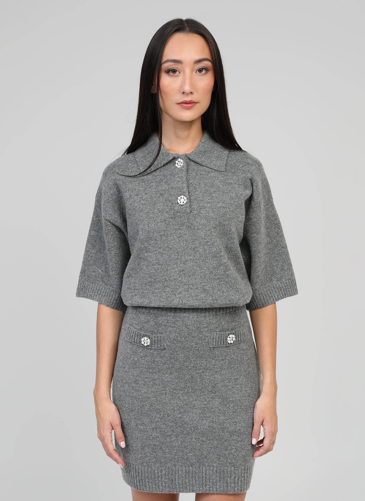 Maglione Norea grigio con colletto polo e bottoni gioiello
