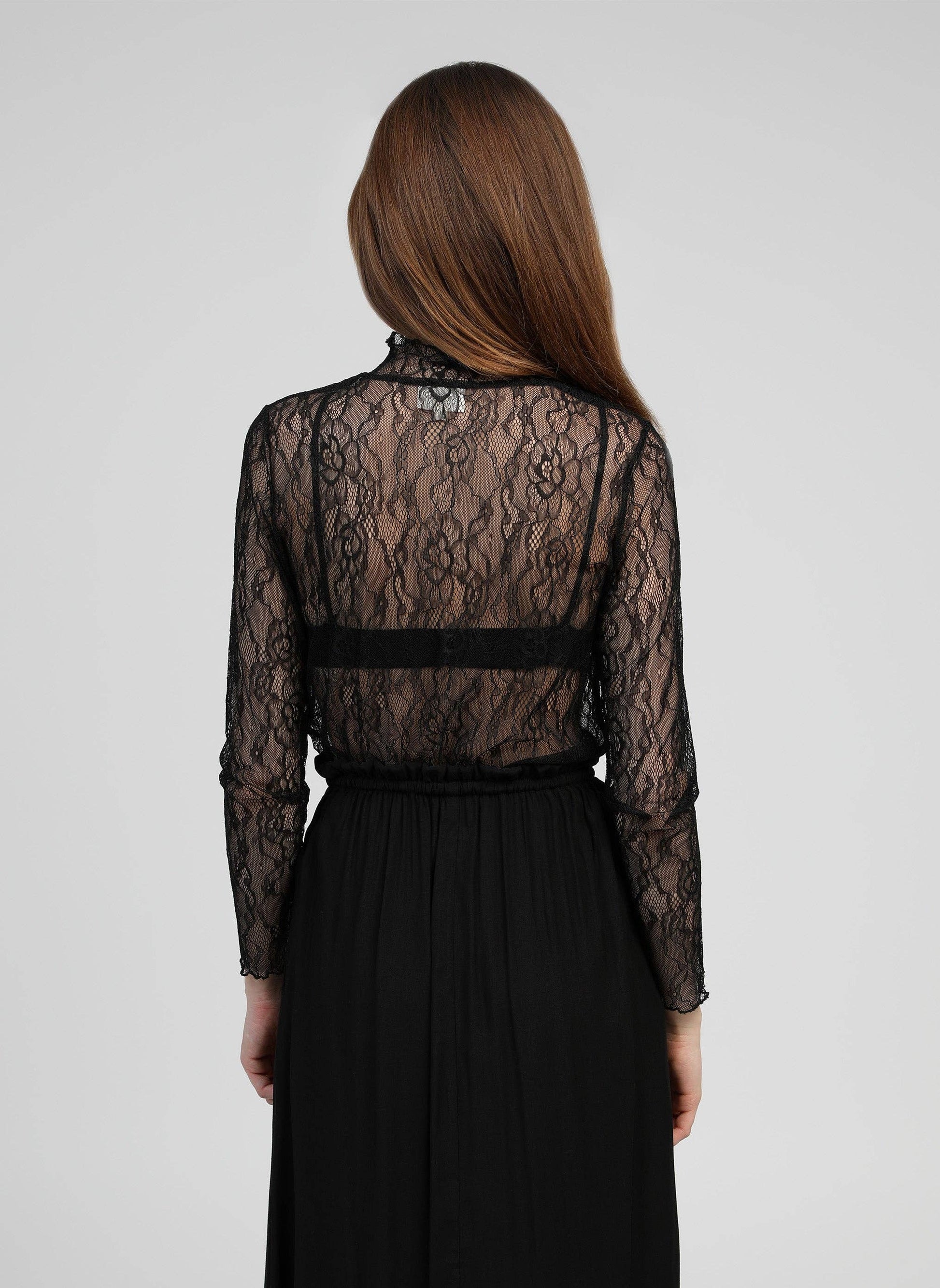 Top in pizzo trasparente nero a maniche lunghe con collo alto