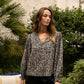 Blusa stampata Calo con scollo a V