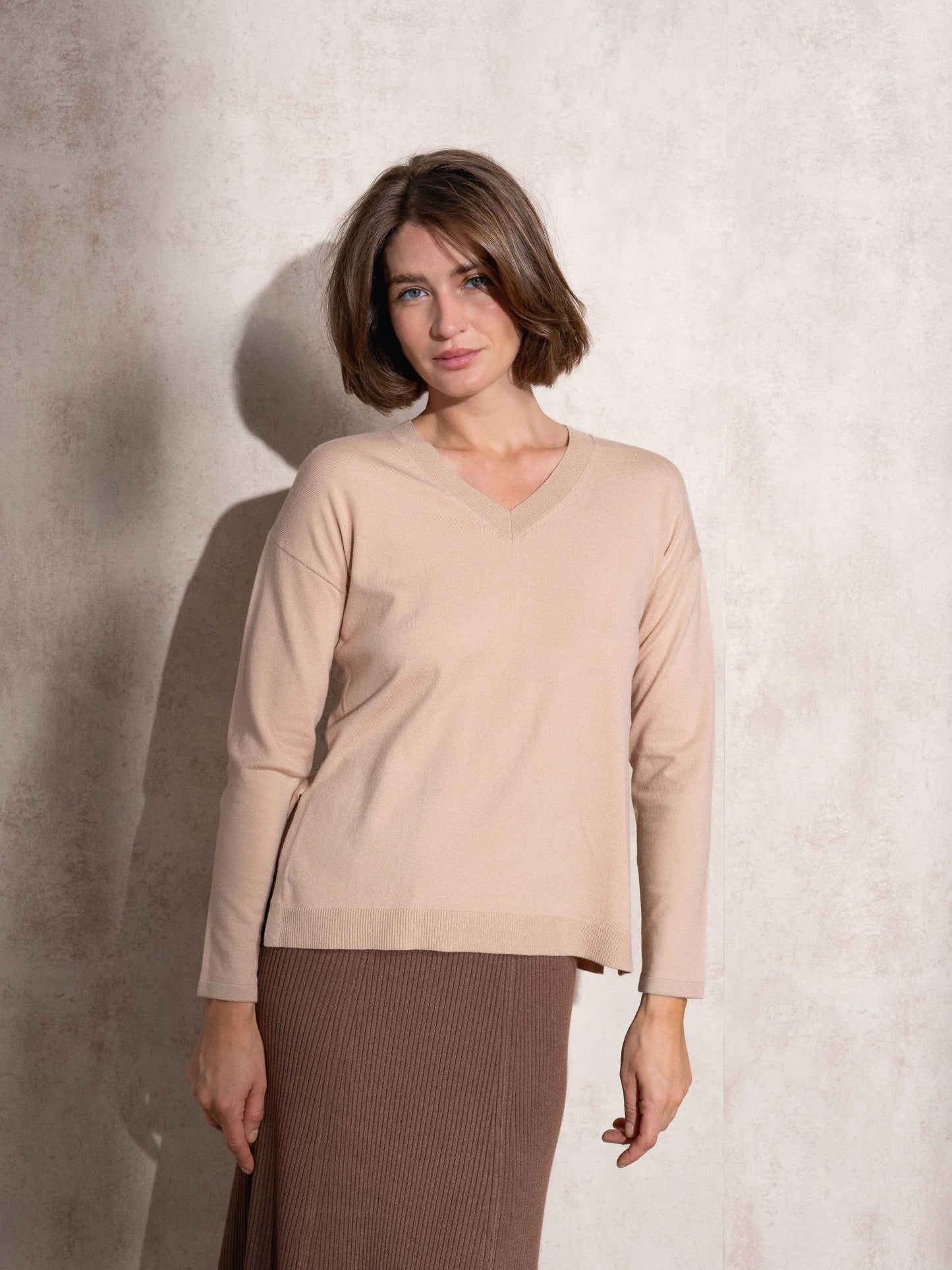 Maglione in maglia lurex con scollo a V