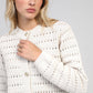 Cardigan in maglia traforata écru con bottoni dorati