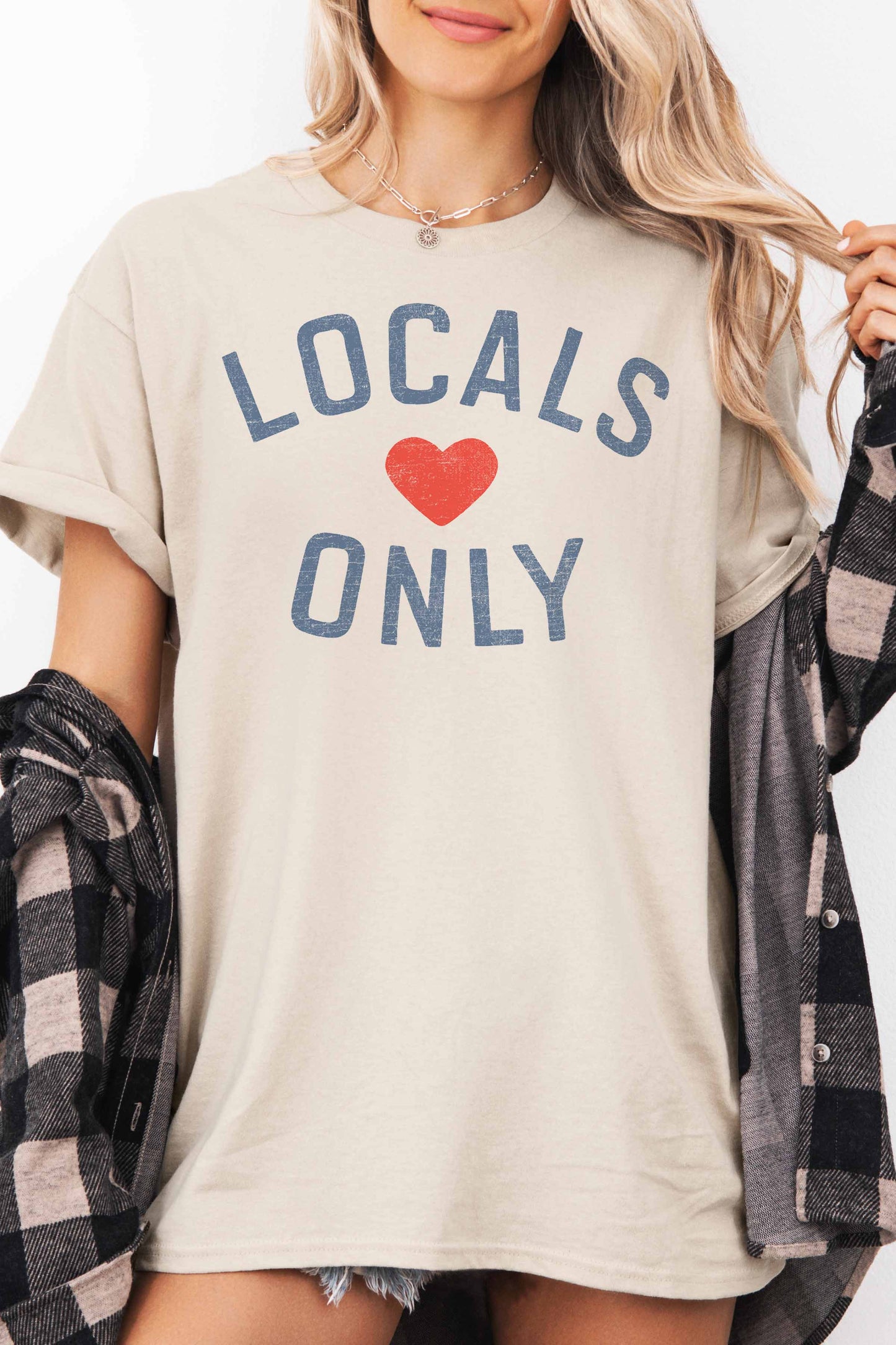 T-shirt oversize grafica “Locals Only” in cotone