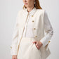 Gilet aderente crema con bottoni dorati