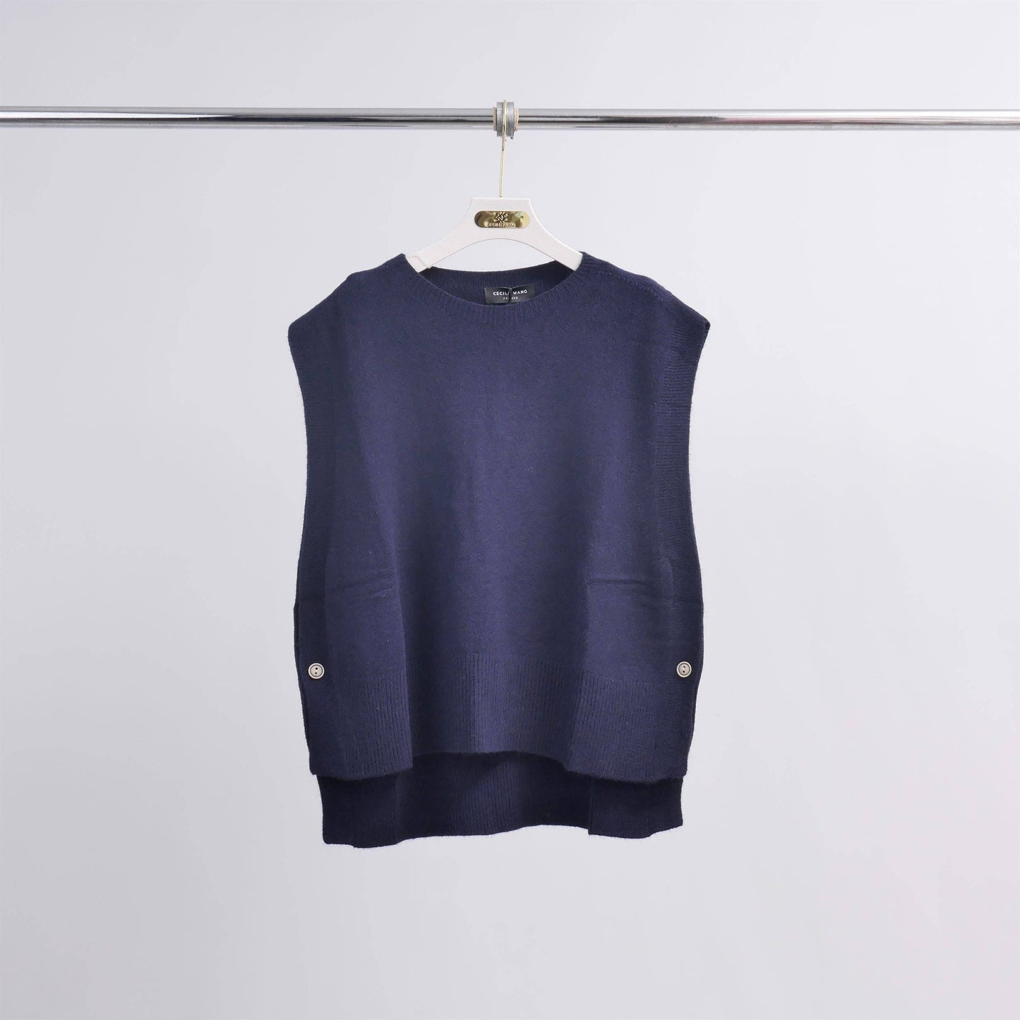 Poncho senza maniche in maglia strutturata con girocollo