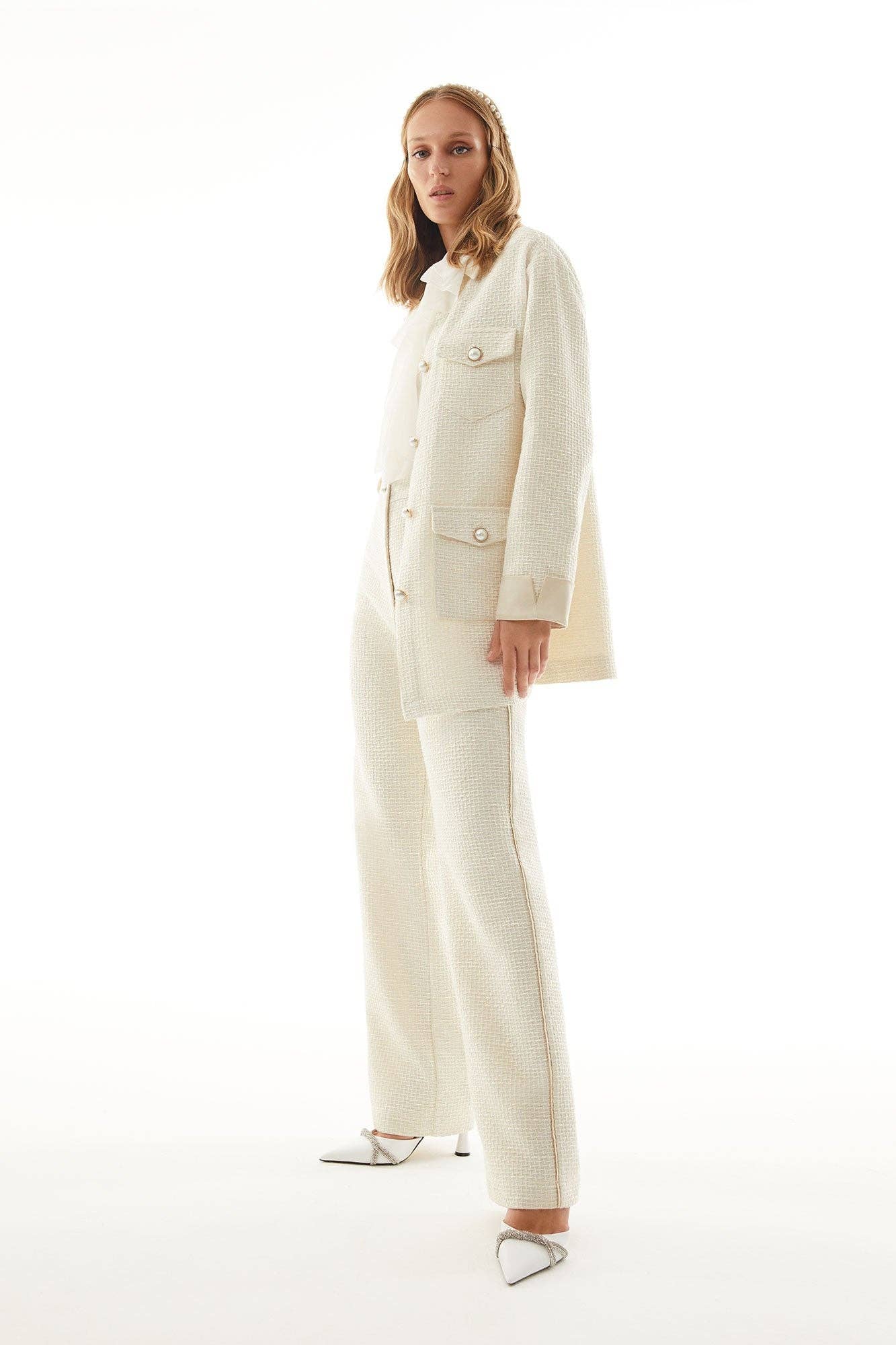 Pantaloni in tweed a vita alta color crema