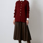Cardigan lungo bordeaux con bottoni dorati