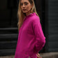 Maglione oversize in maglia con cucitura frontale
