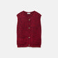 Gilet in maglia con bottoni a contrasto