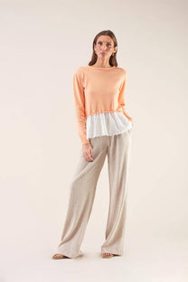 Maglia in cotone con balza ricamata
