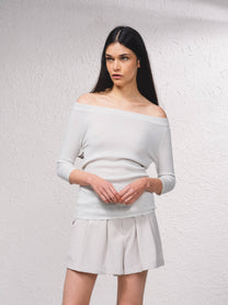 Maglione lurex off-shoulder