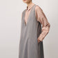 Abito salopette in denim con scollo a V