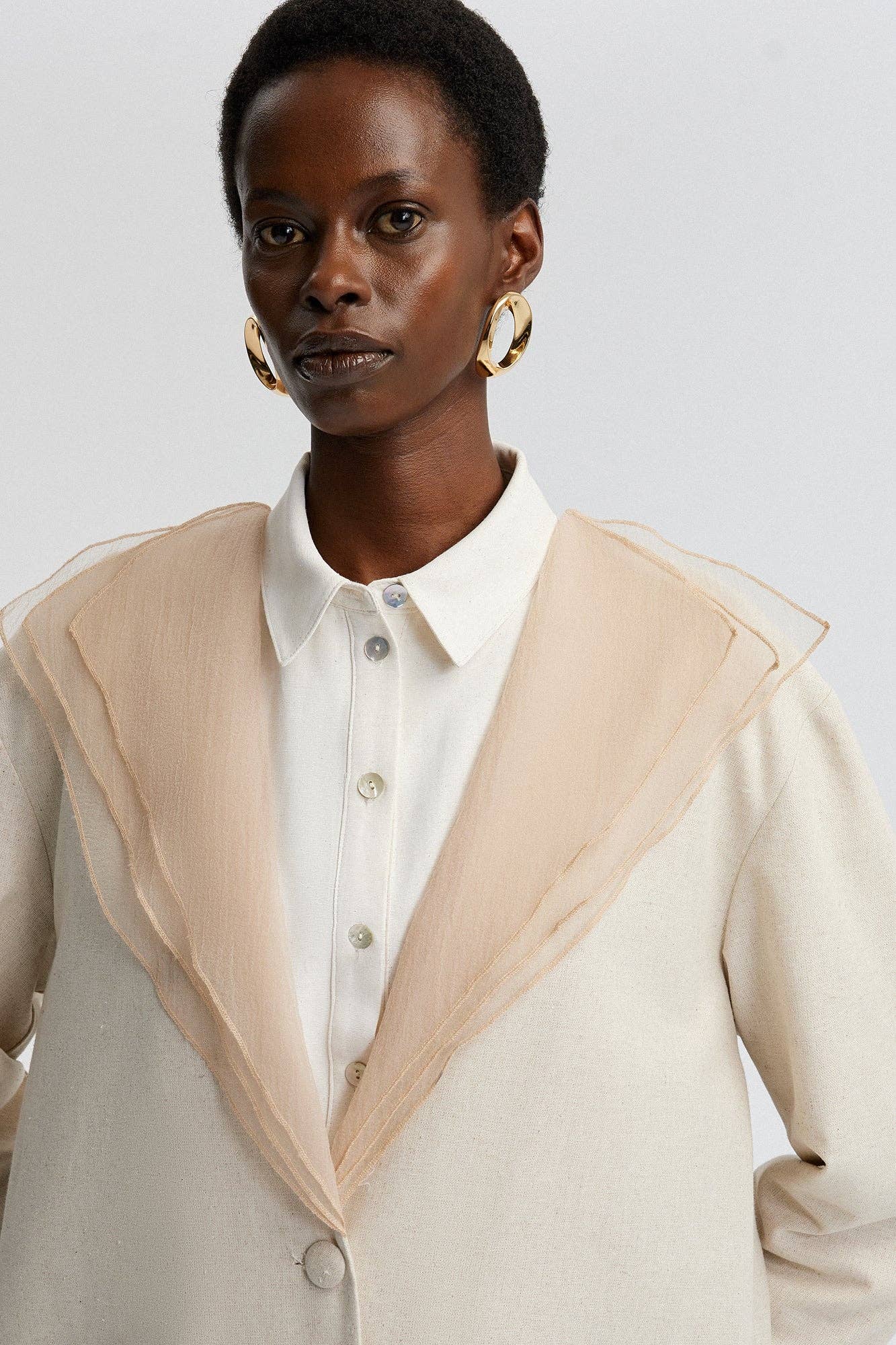 Giacca in lino con colletto in organza