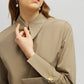 Camicia in popeline beige con polsini oversize