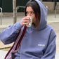 Felpa con cappuccio blu lavato oversize in cotone biologico