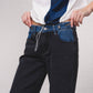 Jeans bicolore in denim con tasche zip