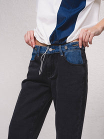 Jeans bicolore in denim con tasche zip