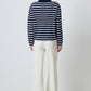 Maglione a righe con scollo a polo