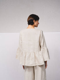Blusa ampia in lino con scollo a V