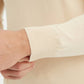 Maglione beige in cotone con collo camionista e zip