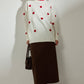 Maglione in maglia ecru con cuori ricamati
