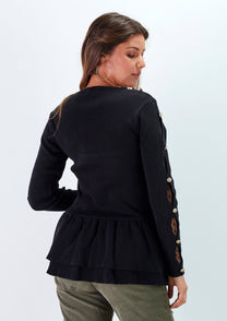 Maglia peplum con inserti in pizzo e bottoni