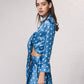 Blusa satinata a pois con fiocco