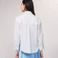 Camicetta oversize con bottoni frontali e colletto classico