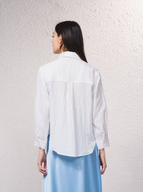 Camicetta oversize con bottoni frontali e colletto classico