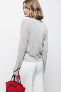 Maglione a maglia rasata con dettagli metallici