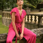 Tuta jumpsuit Pintas a pois fucsia