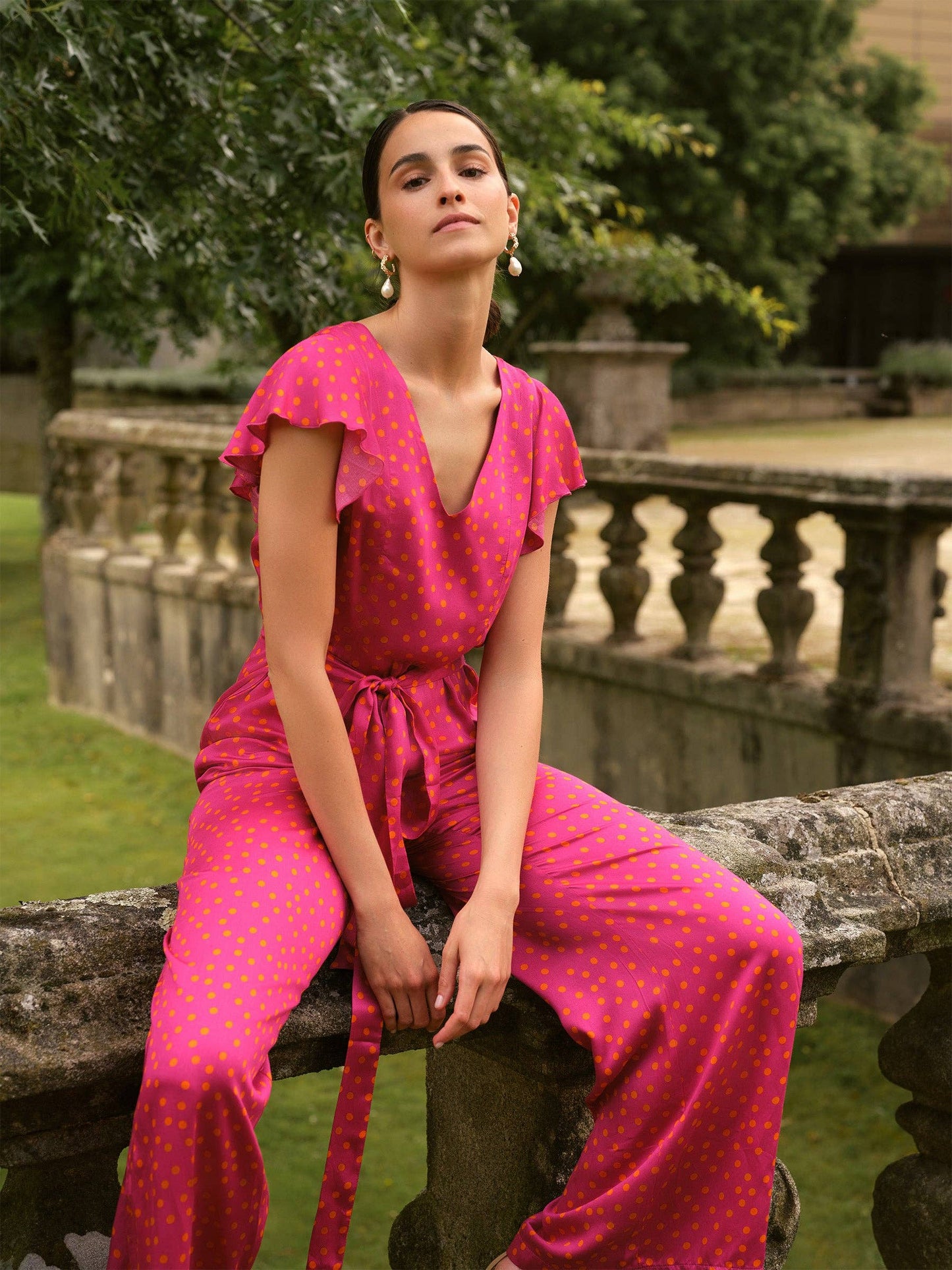 Tuta jumpsuit Pintas a pois fucsia